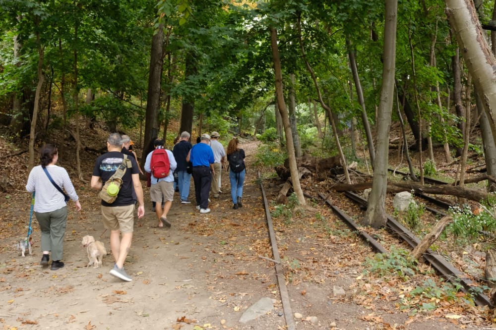 People hiking on the proposed QueensWay trail