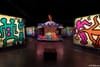 A carousel and two large paintings by Keith Haring from Luna Luna exhibition in LA