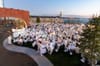 Guest set up their tables along the waterfront at Diner en Blanc
