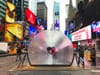 Giant, Reflective Lens Now on View at NYC’s Times Square for Valentine’s Day