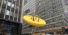 The new yellow Big Button sculpture in Manahattan's Garment District, NYC